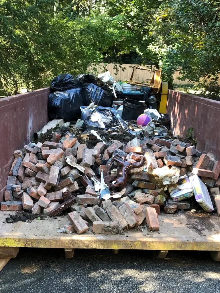 Demolition from a brick patio, furniture and yard waste