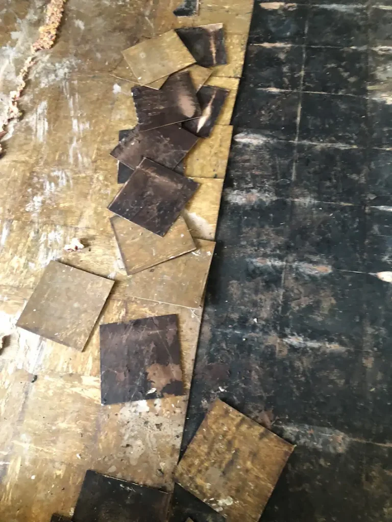 Removal of vinyl composite tiles from a basement floor